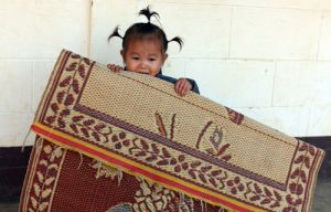 Rug Rat - Lao Child  in a Small Village 